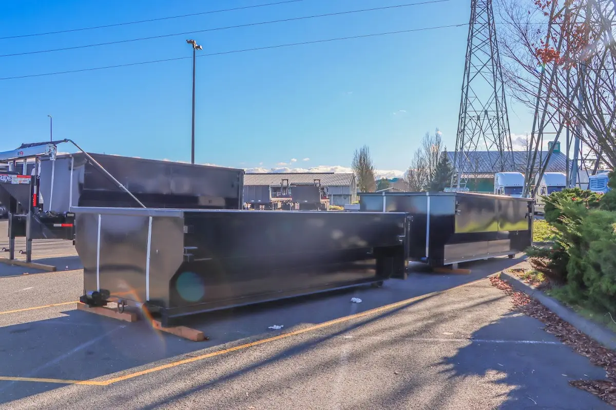 Roll-off dumpster ready for waste disposal at job site for Construction Dumpster Rental in Warren